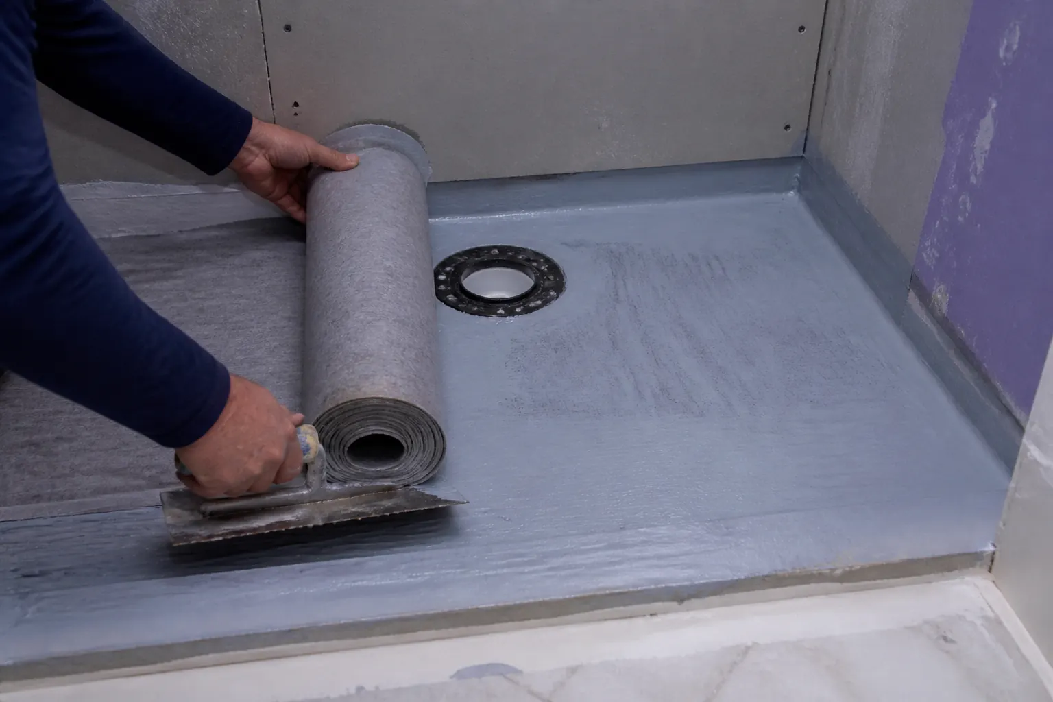 Waterproofing a shower pan before tile during bathroom remodeling in Lakeland FL