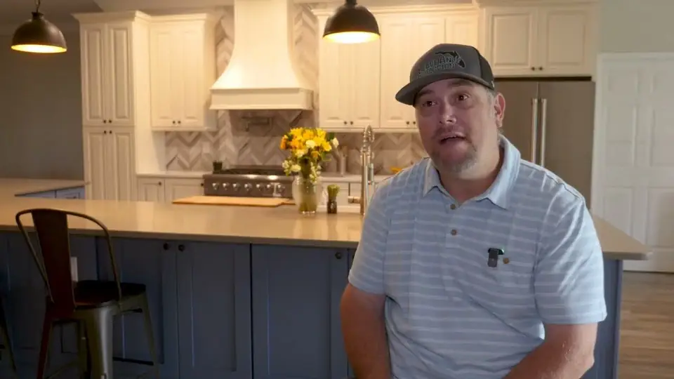 Home remodeling in Central Florida: a finished kitchen and open living space after True Builders rebuilt the home's entire bottom floor