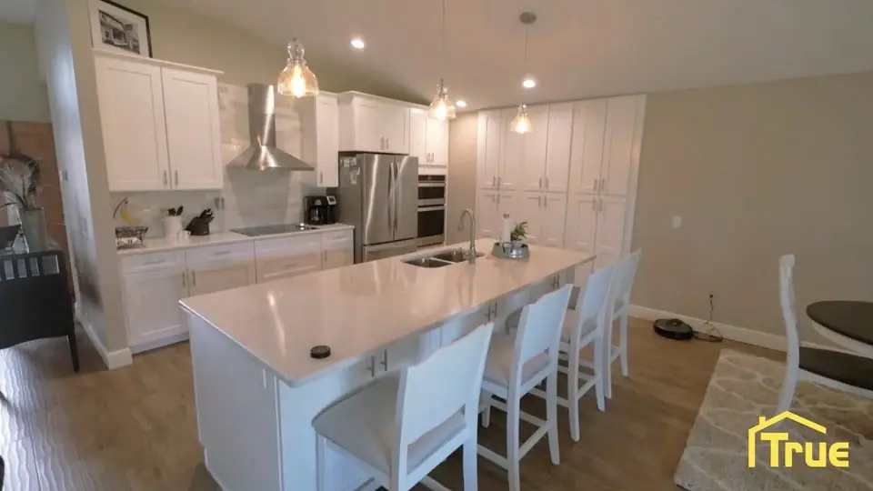 Kitchen remodel with new cabinetry and flooring by True Builders, the kind of work we run in Brandon FL
